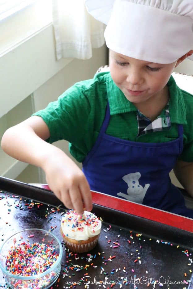 Surprise Cupcakes topped with sprinkles